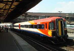 picture of South West Trains Livered class 442 Wessex electric passing through Clapham Junction 